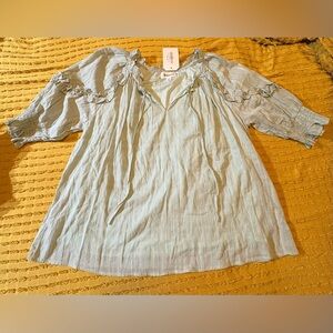 Chic Light Blue Blouse with Ruffle Accents